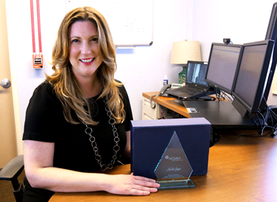 Nicole Joyce with NCURA award